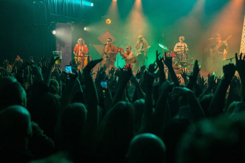 Sint Maarten band expert performing live music at a Caribbean beach event by Funk Workshop